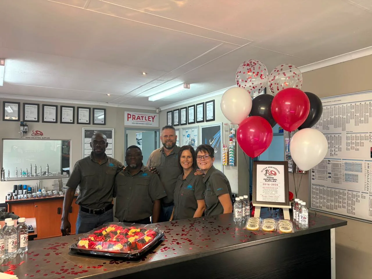 Rapid Industrial Supplies team celebrating its ten-year anniversary